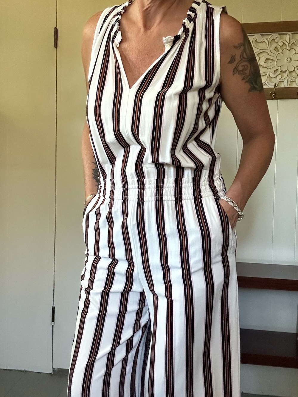 LOFT White striped Jumpsuit with ruffle collar.